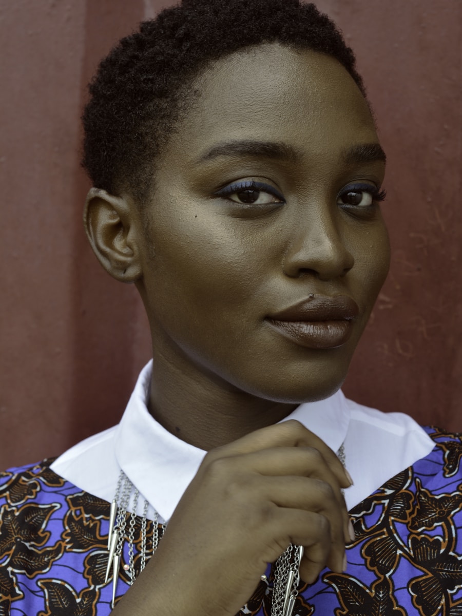 Portrait of Zainab, a Nigerian woman in soft light.